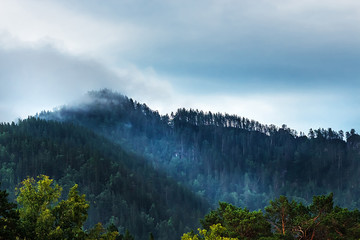 Fog on mountain tops. Mountain Altai