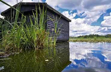 A little boathouse, located at a germany lake.