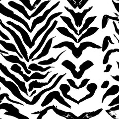 Brush painted zebra seamless pattern. Black and white tiger stripes grunge background.