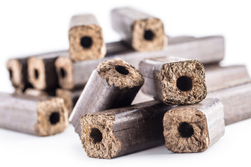 Wooden pressed briquettes Pini Kay from biomass.
