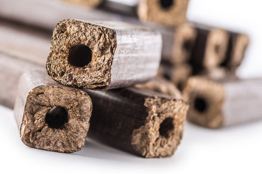 Wooden pressed briquettes Pini Kay from biomass.