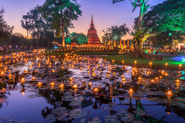 Sukhothai Co Lamplighter Loy Kratong Festival at The Sukhothai Historical Park covers the ruins of...