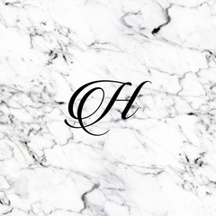 Abstract natural marble texture and alphabet H