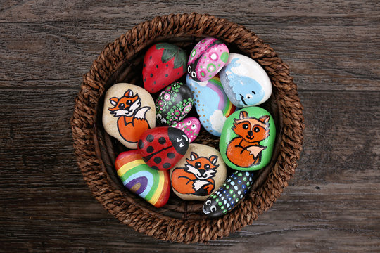 Collection of Hand Painted Colorful Cartoon Rocks in w Wicker Basket