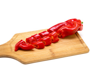 Red pepper on white background. Natural farm product. Image for cafe advertising, food.