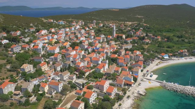 Aerial - Croatian coastline town on island Unije