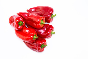 Red pepper on white background. Natural farm product. Image for cafe advertising, food.