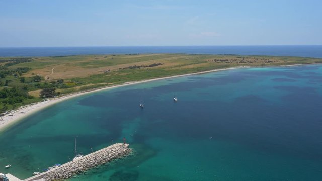 Aerial - High angle view of a coastline near the seaside town
