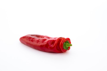 Red pepper on white background. Natural farm product. Image for cafe advertising, food.