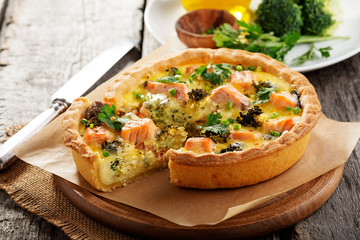 French quiches pie with broccoli,cheese and salmon. © Nelea Reazanteva
