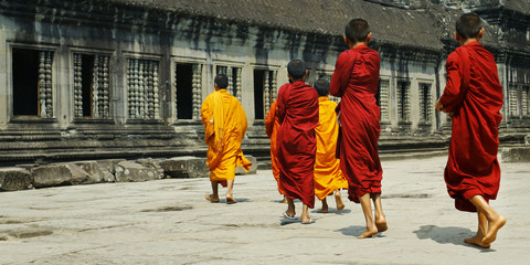 Young monks walking in Angkor wat temple,Cambodia