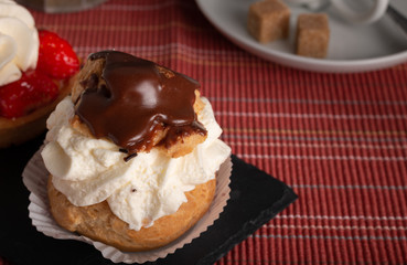 sweet homemade whipped cream with chocolate tart
