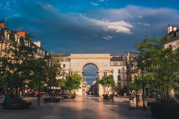 Dijon triumphal arch square in evening sunset