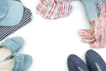 Womens clothing denim shorts on white background with copy space. Trendy fashion outfit. Shopping concept. Mock up for online store. Flat lay. Summer collection.