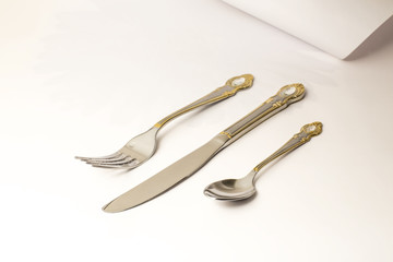 Spoon, fork, knife
