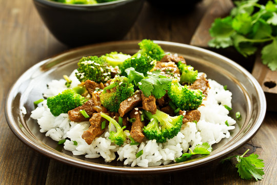 Beef with broccoli and rice. Asian cuisine.