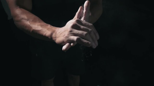 Athlete Hands Applying Gym Chalk 2