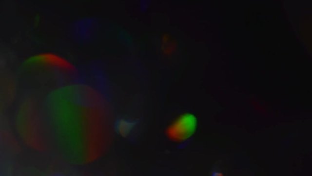 Futuristic abstract background, holographic iridescent foil, highlights and reflections.