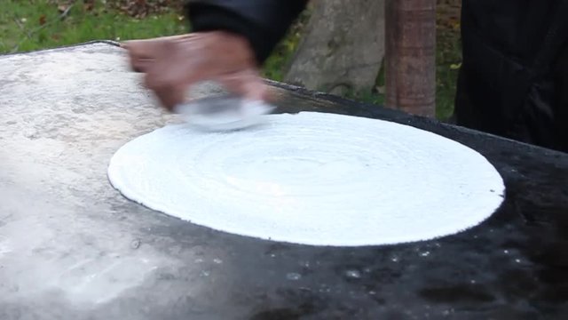 Dosa being made