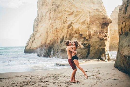 Couple enjoying beach, Canoa, Manabi, Ecuador