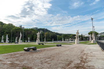 Marble statues of athletes in the Stadio dei Marmi. The Stadium of the Marbles is a sport stadium...
