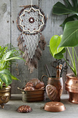 Dream catcher on gray background.