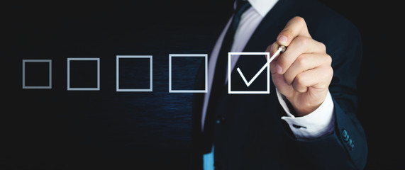 Man with checkbox. Business concept