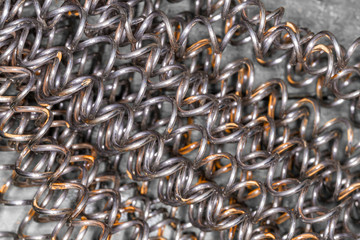 Steel spring. Iron wire with traces of rust.