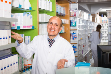 Male pharmacist in drugstore.