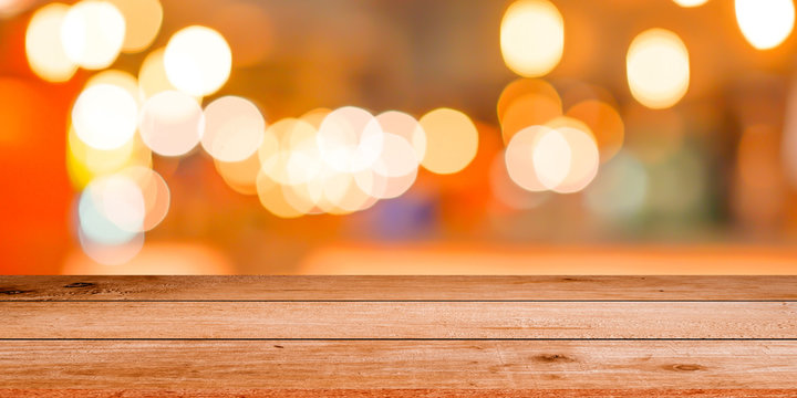 Abstract Blurred Candle Light (ceremony) On Halloween Day With Perspective Wood Plank For Show , Promote On Display Concept