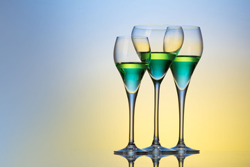 three glasses with a cocktail