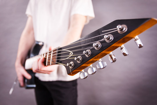 Close up on guitar fretboard