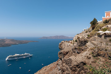 Panoramic view on volcanic caldera from cliff of Santorini island, Greece