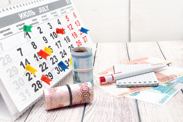 Money, pen, notebook and calendar. Business still life