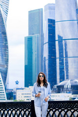 portrait of a beautiful brunette in the city