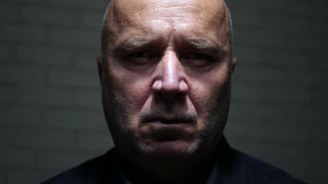Sad Man Face Looking Hopeless and Upset to the Camera