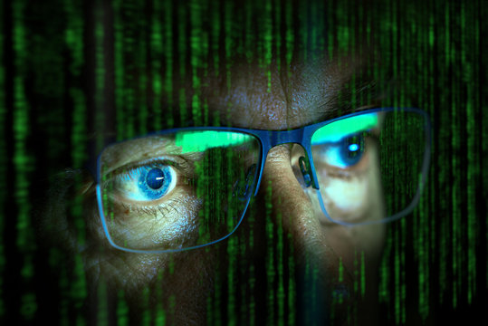 Close up of computer hacker - Powered by Adobe
