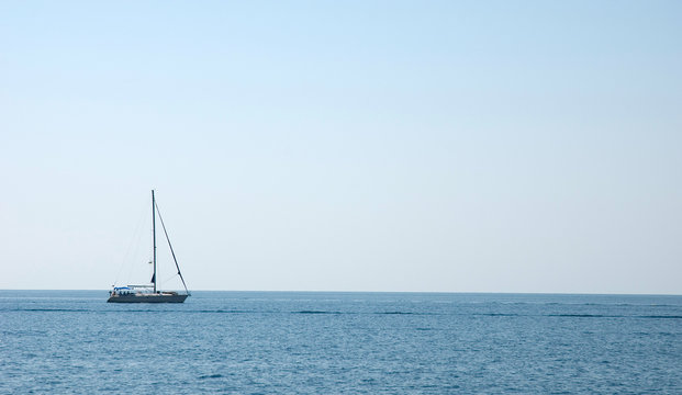 Fototapeta Sailing yacht in ocean or sea. Travel and active lifestyle concept..