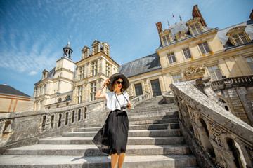 Woman near the Fontainebleau palace in France