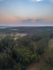 Beautiful misty evening landscape photographed from drone