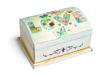Isolated rustic white coffer with text ''love'' on the top with white background	