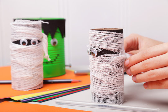 Female Hands Working On A Halloween Craft Project