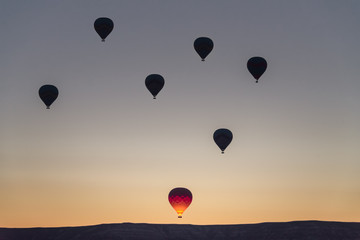 Turkey, Cappadocia, flying in a hot air balloon. Cliffs, caricatures.