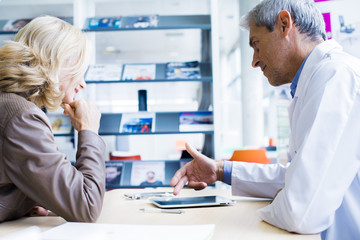 Doctor consulting patient in clinic