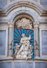 Statue of Saint Agatha on the facade of Catania Duomo. Sicily, Italy.