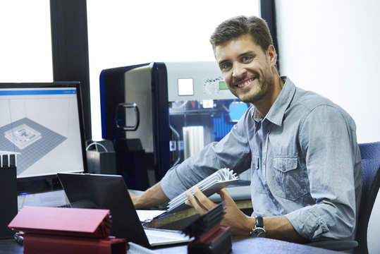 Portrait of engineer working in office