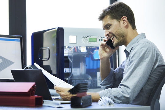 Engineer talking on smart phone