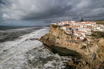 Fototapeta na wymiar Azenhas do Mar, beautiful village in the municipality of Sintra, built on a cliff-top, overlooking the Atlantic Ocean, Portugal. Travel Europe.