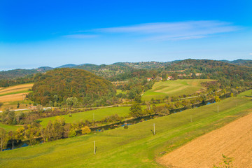 Fototapeta na wymiar Croatian countryside landscape, panoramic view of river Dobra in Novigrad, Karlovac county 