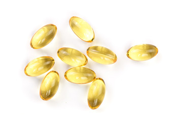 fish oil capsules isolated on white background. Top view. Flat lay pattern